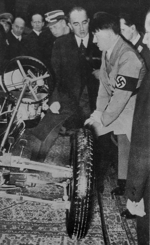 Adolf Hitler at the International Automobile Exhibition in Berlin, inspecting the Mercedes-Benz new cars